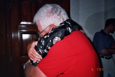 Mom giving her brother a "big hug".