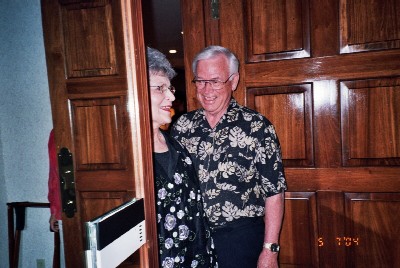 Mom arriving.  She has a look of surprise as she tries recognizes people in the room.